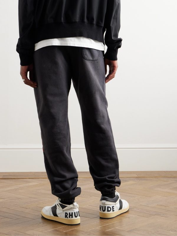 + Denim Tears Tapered Distressed Printed Cotton-Jersey Sweatpants - BK