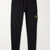 Tapered Logo-Appliquéd Garment-Dyed Cotton-Jersey Sweatpants Tapered Logo-Appliquéd Garment-Dyed Cotton-Jersey Sweatpants