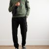 Tapered Logo-Appliquéd Garment-Dyed Cotton-Jersey Sweatpants - OU Tapered Logo-Appliquéd Garment-Dyed Cotton-Jersey Sweatpants - OU