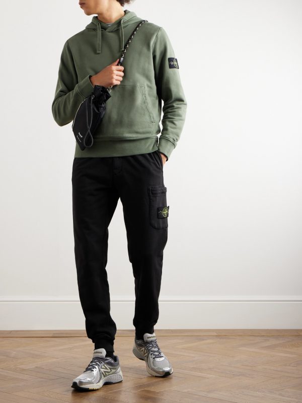 Tapered Logo-Appliquéd Garment-Dyed Cotton-Jersey Sweatpants - OU Tapered Logo-Appliquéd Garment-Dyed Cotton-Jersey Sweatpants - OU