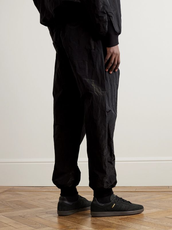 Tapered Logo-Appliquéd Crinkled-Shell Sweatpants - BK Tapered Logo-Appliquéd Crinkled-Shell Sweatpants - BK