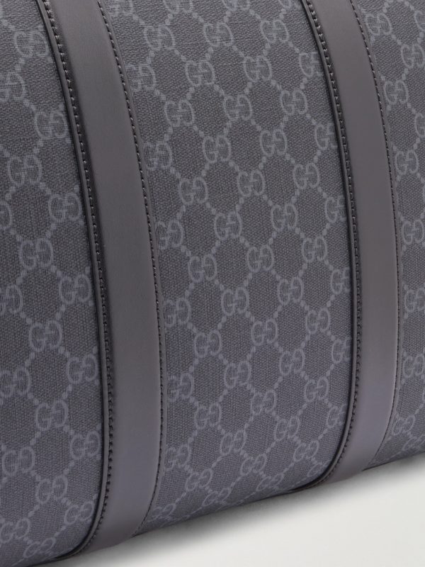 GG Leather-Trimmed Monogrammed Supreme Coated-Canvas Duffle Bag - CU GG Leather-Trimmed Monogrammed Supreme Coated-Canvas Duffle Bag - CU