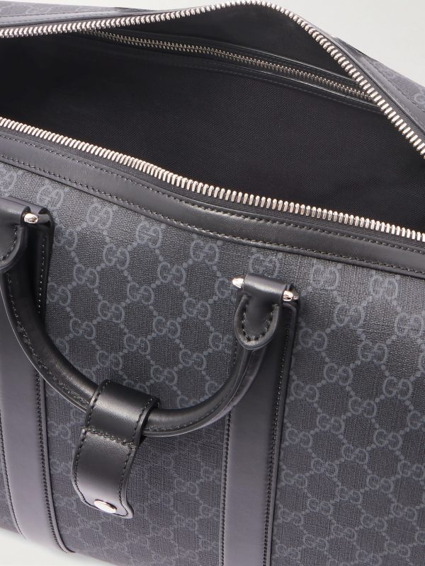GG Leather-Trimmed Monogrammed Supreme Coated-Canvas Duffle Bag - E1 GG Leather-Trimmed Monogrammed Supreme Coated-Canvas Duffle Bag - E1