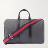 GG Leather-Trimmed Monogrammed Supreme Coated-Canvas Duffle Bag GG Leather-Trimmed Monogrammed Supreme Coated-Canvas Duffle Bag