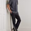 Flared Paint-Splattered Panelled Logo-Print Cotton-Jersey Sweatpants - OU Flared Paint-Splattered Panelled Logo-Print Cotton-Jersey Sweatpants - OU