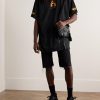 Oversized Distressed Logo-Print Cotton-Jersey T-Shirt - OU Oversized Distressed Logo-Print Cotton-Jersey T-Shirt - OU