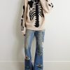 Flared Distressed Patchwork Jeans - OU Flared Distressed Patchwork Jeans - OU