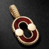 Magnetic 18-Karat Gold, Bull's Eye and Mother-of-Pearl Pendant Magnetic 18-Karat Gold, Bull's Eye and Mother-of-Pearl Pendant