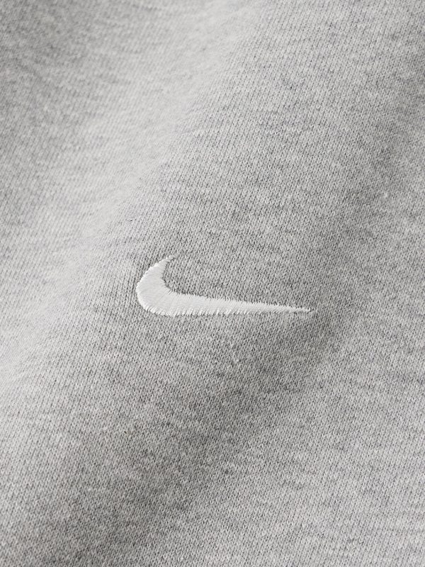 Solo Swoosh Tapered Logo-Embroidered Cotton-Blend Jersey Sweatpants - CU Solo Swoosh Tapered Logo-Embroidered Cotton-Blend Jersey Sweatpants - CU