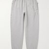 Solo Swoosh Tapered Logo-Embroidered Cotton-Blend Jersey Sweatpants Solo Swoosh Tapered Logo-Embroidered Cotton-Blend Jersey Sweatpants