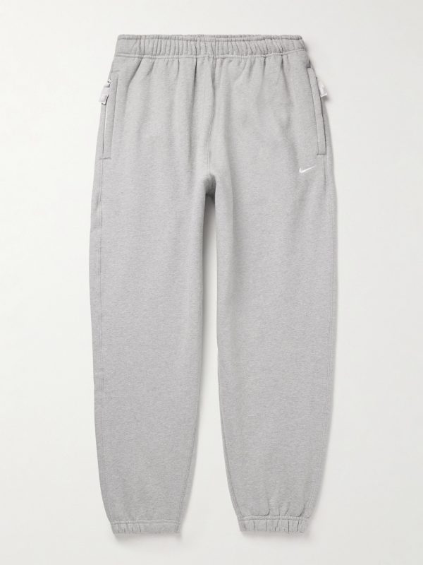Solo Swoosh Tapered Logo-Embroidered Cotton-Blend Jersey Sweatpants Solo Swoosh Tapered Logo-Embroidered Cotton-Blend Jersey Sweatpants