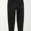 Solo Swoosh Logo-Embroidered Nylon Track Pants Solo Swoosh Logo-Embroidered Nylon Track Pants