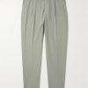 Tapered Pleated Stretch Cotton and Lyocell-Blend Twill Trousers Tapered Pleated Stretch Cotton and Lyocell-Blend Twill Trousers