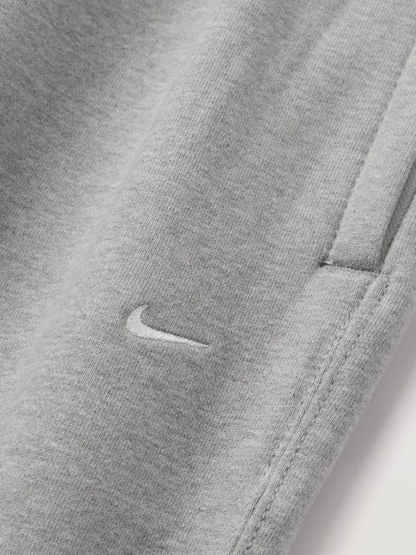 Solo Swoosh Tapered Logo-Embroidered Cotton-Blend Jersey Sweatpants - CU Solo Swoosh Tapered Logo-Embroidered Cotton-Blend Jersey Sweatpants - CU