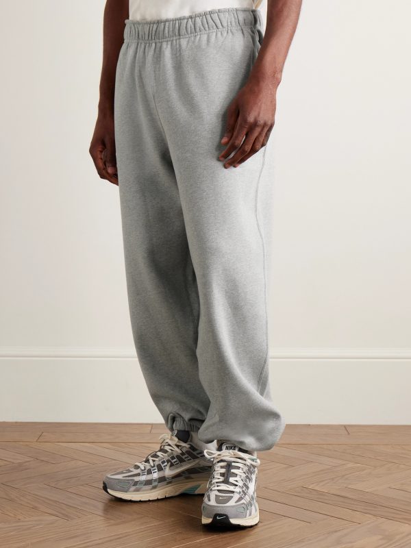 Solo Swoosh Tapered Logo-Embroidered Cotton-Blend Jersey Sweatpants - FR Solo Swoosh Tapered Logo-Embroidered Cotton-Blend Jersey Sweatpants - FR