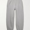 Solo Swoosh Tapered Logo-Embroidered Cotton-Blend Jersey Sweatpants Solo Swoosh Tapered Logo-Embroidered Cotton-Blend Jersey Sweatpants