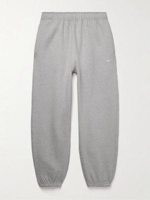 Solo Swoosh Tapered Logo-Embroidered Cotton-Blend Jersey Sweatpants Solo Swoosh Tapered Logo-Embroidered Cotton-Blend Jersey Sweatpants