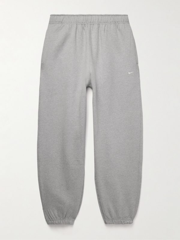 Solo Swoosh Tapered Logo-Embroidered Cotton-Blend Jersey Sweatpants Solo Swoosh Tapered Logo-Embroidered Cotton-Blend Jersey Sweatpants