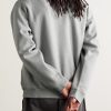 Solo Swoosh Oversized Logo-Embroidered Cotton-Blend Jersey Sweatshirt - BK Solo Swoosh Oversized Logo-Embroidered Cotton-Blend Jersey Sweatshirt - BK