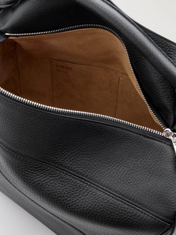 Puzzle Edge Large Logo-Debossed Full-Grain Leather Messenger Bag - E1 Puzzle Edge Large Logo-Debossed Full-Grain Leather Messenger Bag - E1
