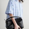 Puzzle Edge Large Logo-Debossed Full-Grain Leather Messenger Bag - E2 Puzzle Edge Large Logo-Debossed Full-Grain Leather Messenger Bag - E2