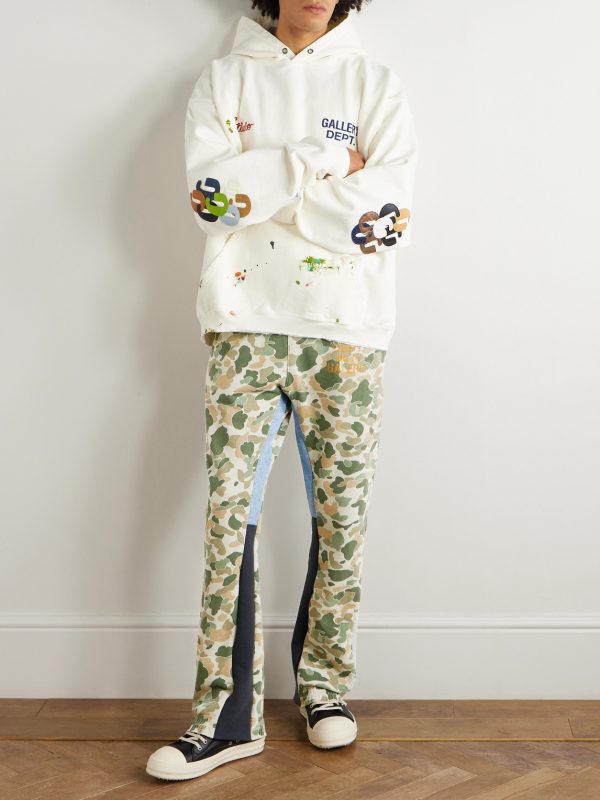 Flared Patchwork Camouflage and Logo-Print Cotton-Jersey Sweatpants - OU Flared Patchwork Camouflage and Logo-Print Cotton-Jersey Sweatpants - OU