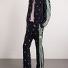 Cropped Flared Webbing-Trimmed Embroidered Cotton-Blend Corduroy Sweatpants - OU Cropped Flared Webbing-Trimmed Embroidered Cotton-Blend Corduroy Sweatpants - OU