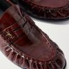 Le Loafer Monogram Logo-Appliquéd Eel Penny Loafers - CU Le Loafer Monogram Logo-Appliquéd Eel Penny Loafers - CU