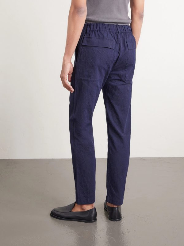 Slim-Leg Crinkled Cotton-Blend Trousers - BK