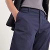 Slim-Leg Crinkled Cotton-Blend Trousers - E1