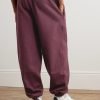 Solo Swoosh Tapered Logo-Embroidered Cotton-Blend Jersey Sweatpants - BK Solo Swoosh Tapered Logo-Embroidered Cotton-Blend Jersey Sweatpants - BK