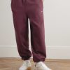 Solo Swoosh Tapered Logo-Embroidered Cotton-Blend Jersey Sweatpants - FR Solo Swoosh Tapered Logo-Embroidered Cotton-Blend Jersey Sweatpants - FR