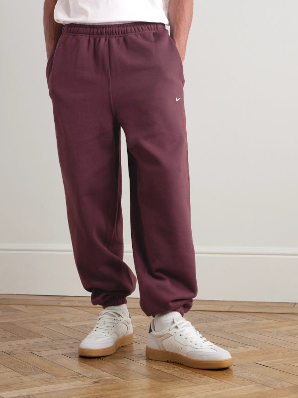Solo Swoosh Tapered Logo-Embroidered Cotton-Blend Jersey Sweatpants - FR Solo Swoosh Tapered Logo-Embroidered Cotton-Blend Jersey Sweatpants - FR