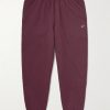 Solo Swoosh Tapered Logo-Embroidered Cotton-Blend Jersey Sweatpants Solo Swoosh Tapered Logo-Embroidered Cotton-Blend Jersey Sweatpants