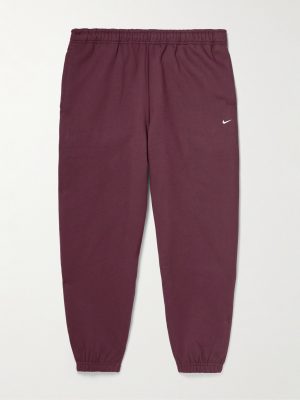 Solo Swoosh Tapered Logo-Embroidered Cotton-Blend Jersey Sweatpants Solo Swoosh Tapered Logo-Embroidered Cotton-Blend Jersey Sweatpants