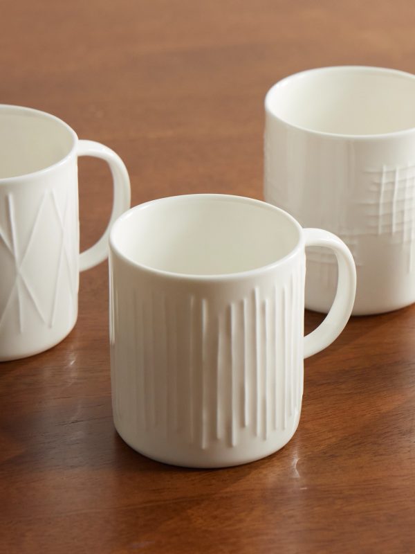 Set of Four Embossed Porcelain Mugs - CU Set of Four Embossed Porcelain Mugs - CU