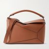 Puzzle Edge Large Logo-Debossed Leather Messenger Bag Puzzle Edge Large Logo-Debossed Leather Messenger Bag