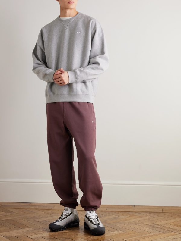 Solo Swoosh Logo-Embroidered Cotton-Blend Jersey Sweatpants - OU Solo Swoosh Logo-Embroidered Cotton-Blend Jersey Sweatpants - OU