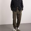 Solo Swoosh Tapered Logo-Embroidered Cotton-Blend Jersey Sweatpants - OU Solo Swoosh Tapered Logo-Embroidered Cotton-Blend Jersey Sweatpants - OU