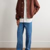 Anagram Wide-Leg Logo-Embroidered Jeans - OU Anagram Wide-Leg Logo-Embroidered Jeans - OU