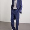 Tapered Pleated Linen-Twill Drawstring Trousers - OU Tapered Pleated Linen-Twill Drawstring Trousers - OU