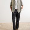 Daniel Tapered Pleated Cotton-Canvas Trousers - OU