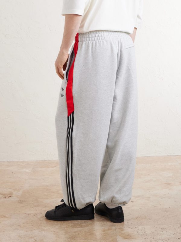 + Willy Chavarria Tapered Appliquéd Stretch-Cotton Jersey Sweatpants - BK
