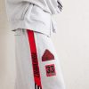 + Willy Chavarria Tapered Appliquéd Stretch-Cotton Jersey Sweatpants - CU