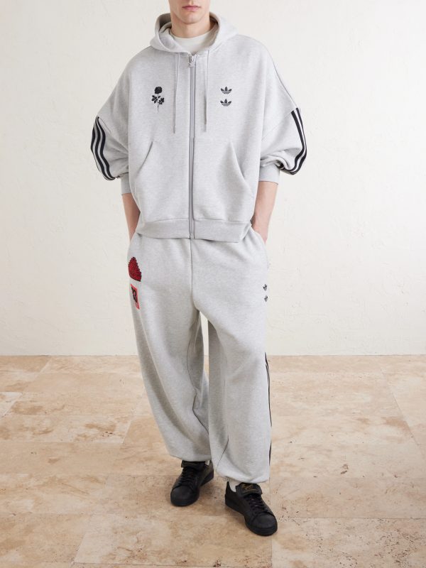 + Willy Chavarria Tapered Appliquéd Stretch-Cotton Jersey Sweatpants - OU