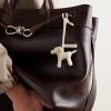 Logo-Debossed Intrecciato Leather Bag Charm - OU Logo-Debossed Intrecciato Leather Bag Charm - OU