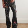 G-Time Flared Distressed Logo-Appliquéd Jeans - FR