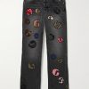 G-Time Flared Distressed Logo-Appliquéd Jeans