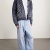 Wide-Leg Distressed Jeans - OU