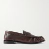 Le Loafer Monogram Logo-Appliquéd Full-Grain Leather Penny Loafers Le Loafer Monogram Logo-Appliquéd Full-Grain Leather Penny Loafers